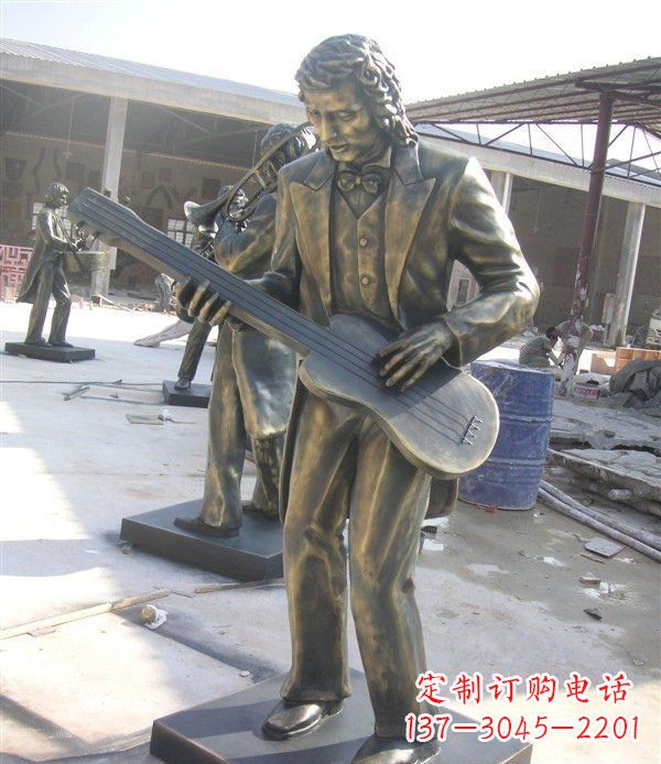 福州西方人物铜吉他雕塑