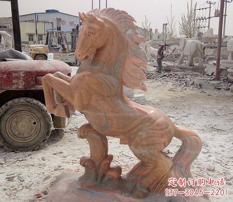福州晚霞红踏浪奔马石雕