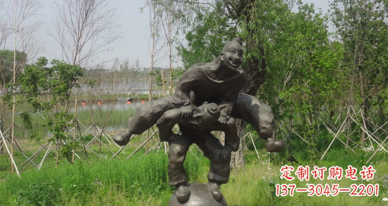福州园林站在球上面跳山羊的人物景观铜雕